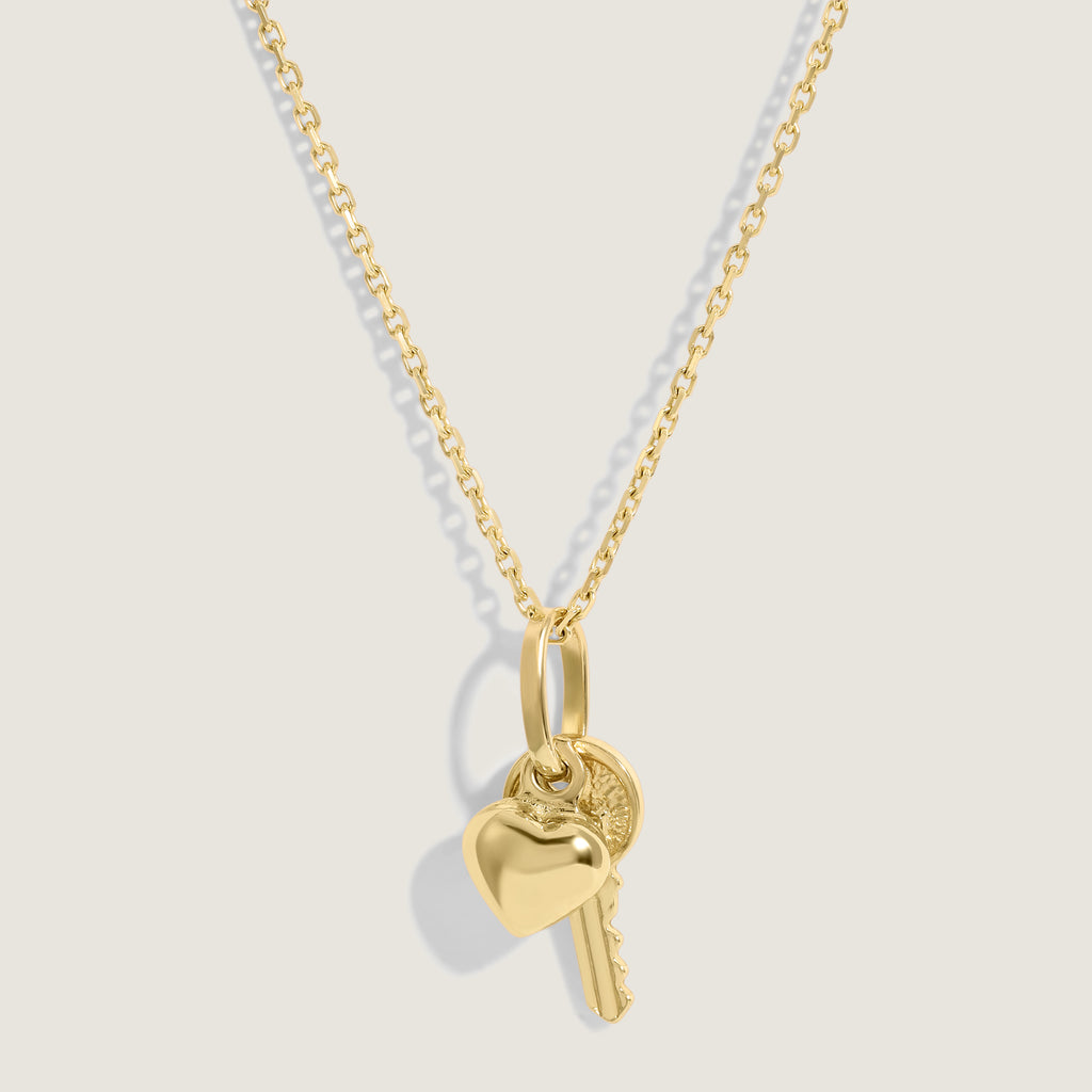 Key and hear pendant with rolo cable chain